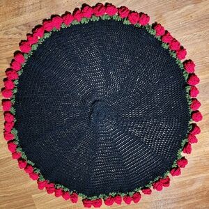 Black Crochet Round Cushion with Red and Green Accents